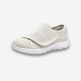 Chaussure orthopédique beige pour femme avec fermeture à scratch, sur fond neutre