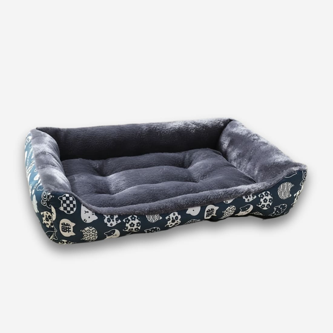 Panier orthopédique pour chien intérieur polaire gris. L'extérieur est bleu avec des motifs blancs. Panier de forme rectangulaire sur fond uni clair.