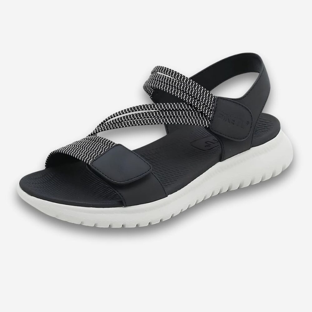 Sandales orthopédiques légères et ajustables pour femme de couleur noire avec deux brides ajustables par scratch. La semelle extérieure est blanche.