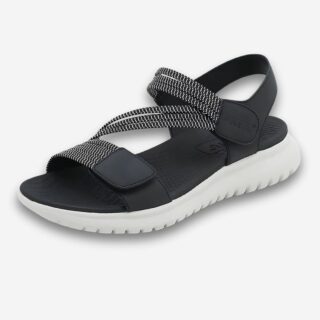 Sandales orthopédiques légères et ajustables pour femme de couleur noire avec deux brides ajustables par scratch. La semelle extérieure est blanche.